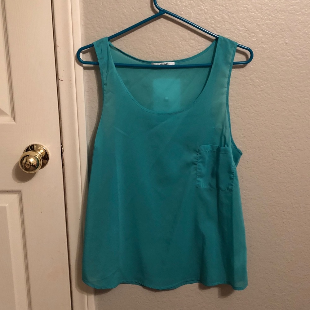 Sleeveless teal blouse